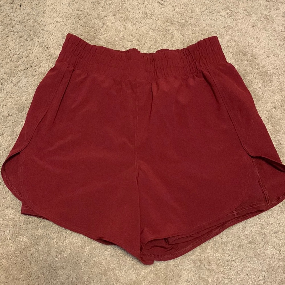 Athletic shorts with built in spandex and pockets